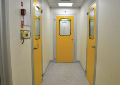 Icrom image showing three yellow doors in a hallway
